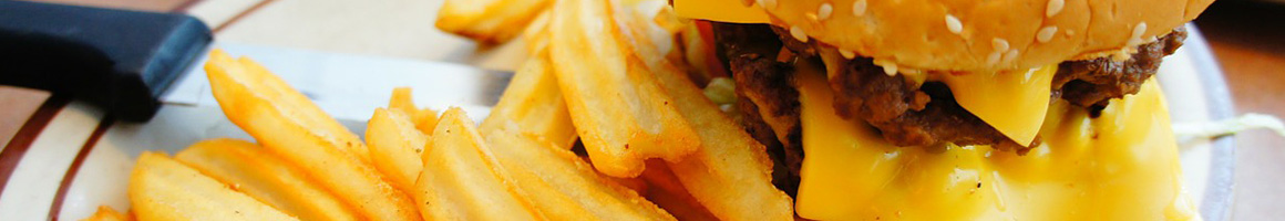 Eating American (New) Burger at Rock & Brews restaurant in Overland Park, KS.
